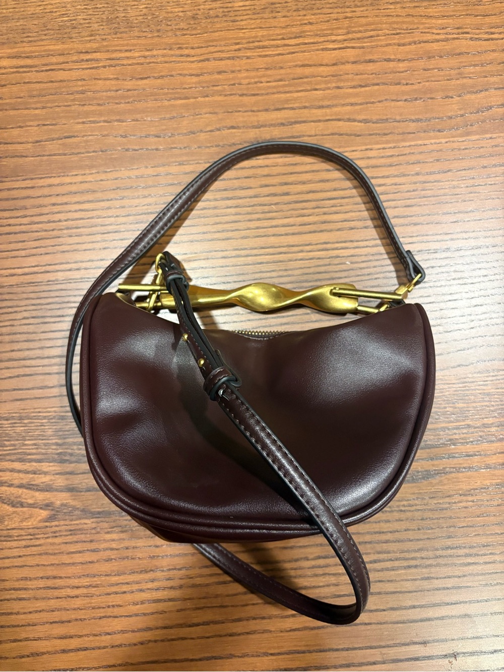 Zara burgundy shoulder bag with gold twist handle